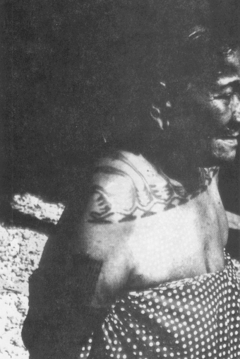 Side view of the shoulder tattoo of Lijibrik a woman of chiefly rank on